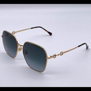 Gucci gold and black sunglasses🕶